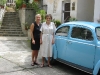 Elizabeth with Bernadette McDonald beside her favorite - and famous - car